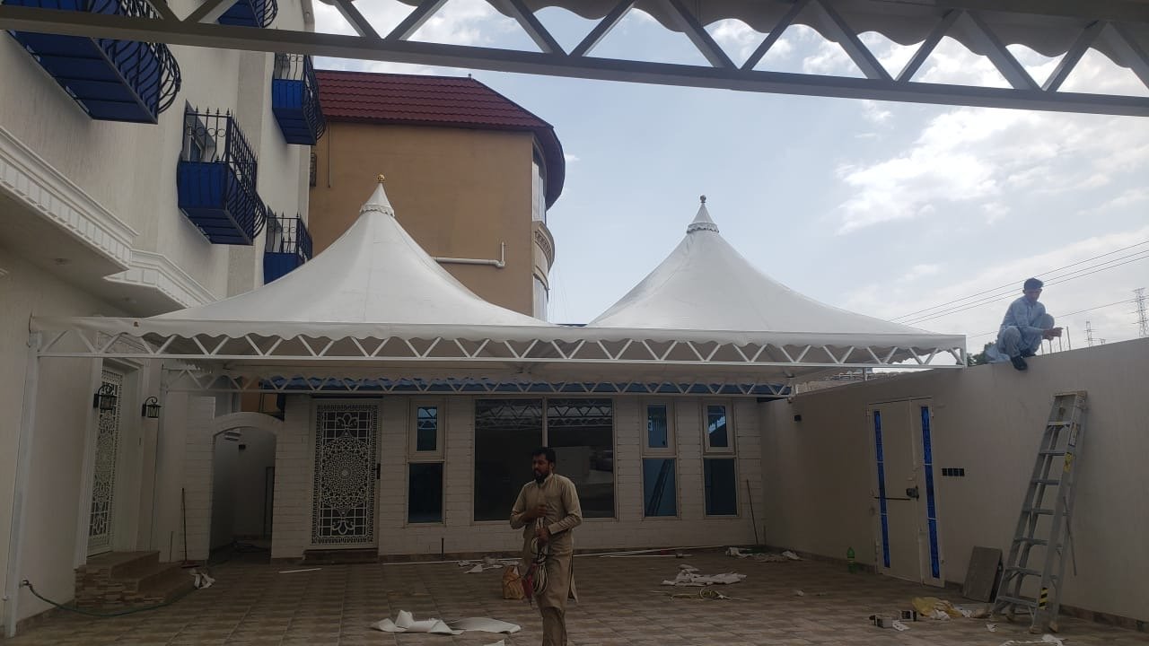 تركيب مظلة حوش حديد في أبها بتصميم قوي